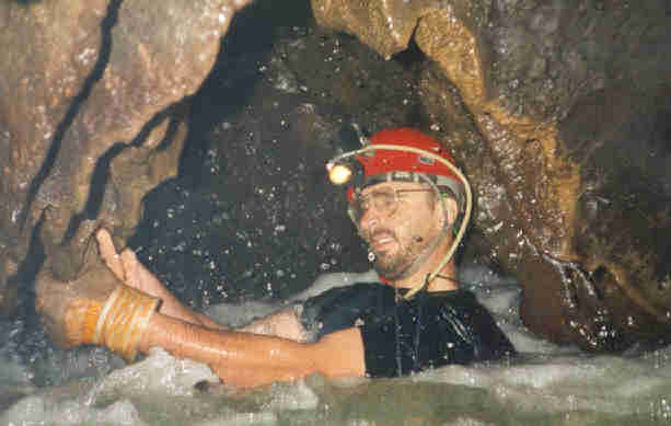 Steve in the showers underneath the lake at the end of Chieng Ban 2